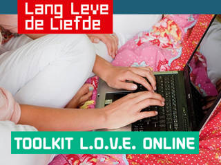 four boy playing ball on green grass